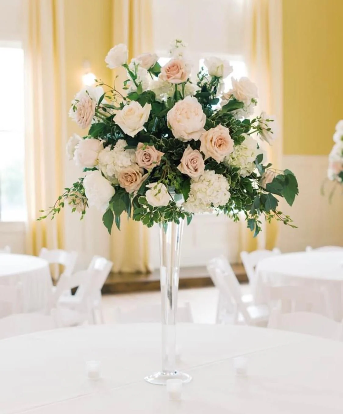 Beautiful High Centerpiece of Mixed Roses on a Glass