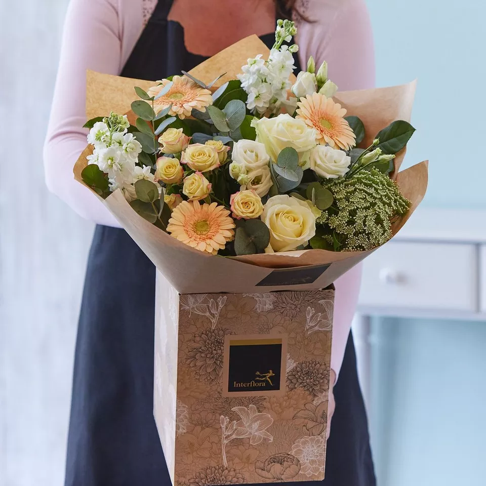 Sympathy hand-tied made with the finest flowers