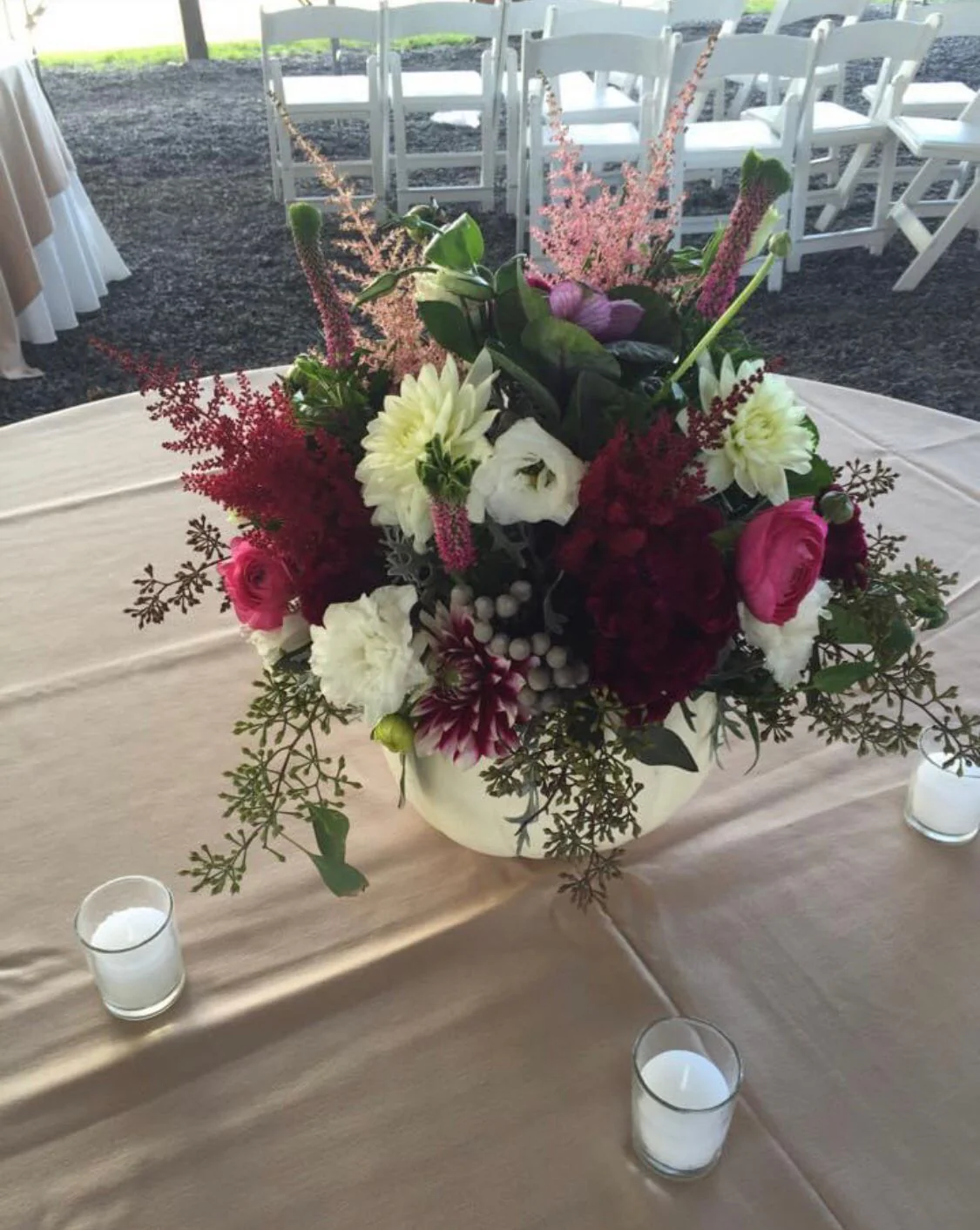 White Pumpkin Centerpiece Filled with Wild Flowers